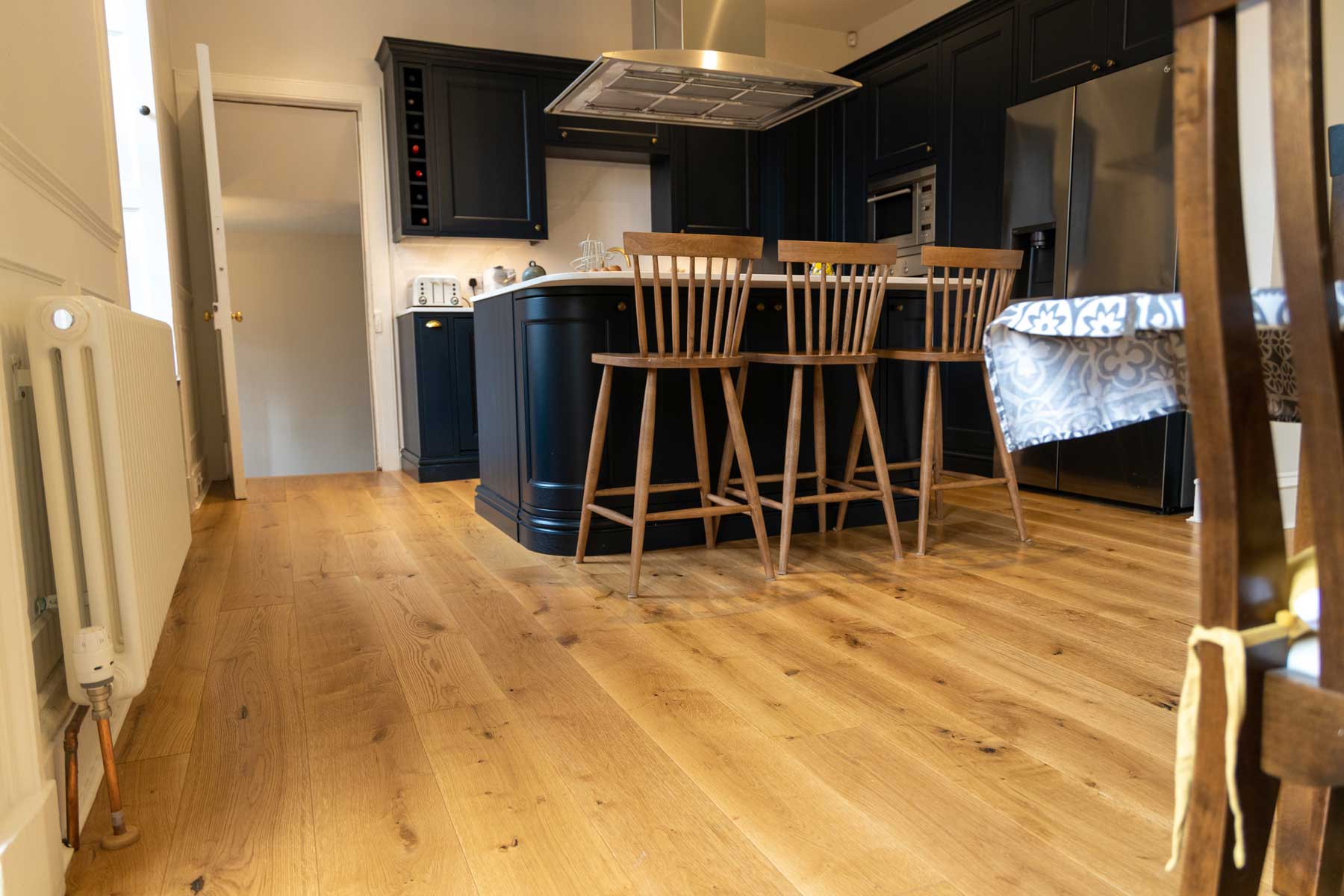 Hardwood kitchen flooring installed by Rocks Property Restoration, Edinburgh
